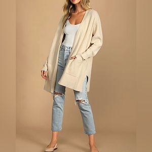 A cream colored mid length cardigan!